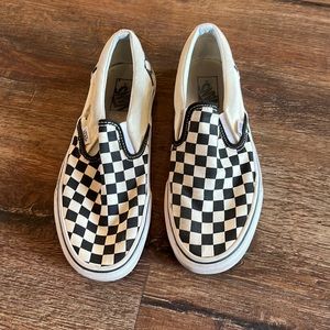 Checkered Vans slip on shoes in cream and black